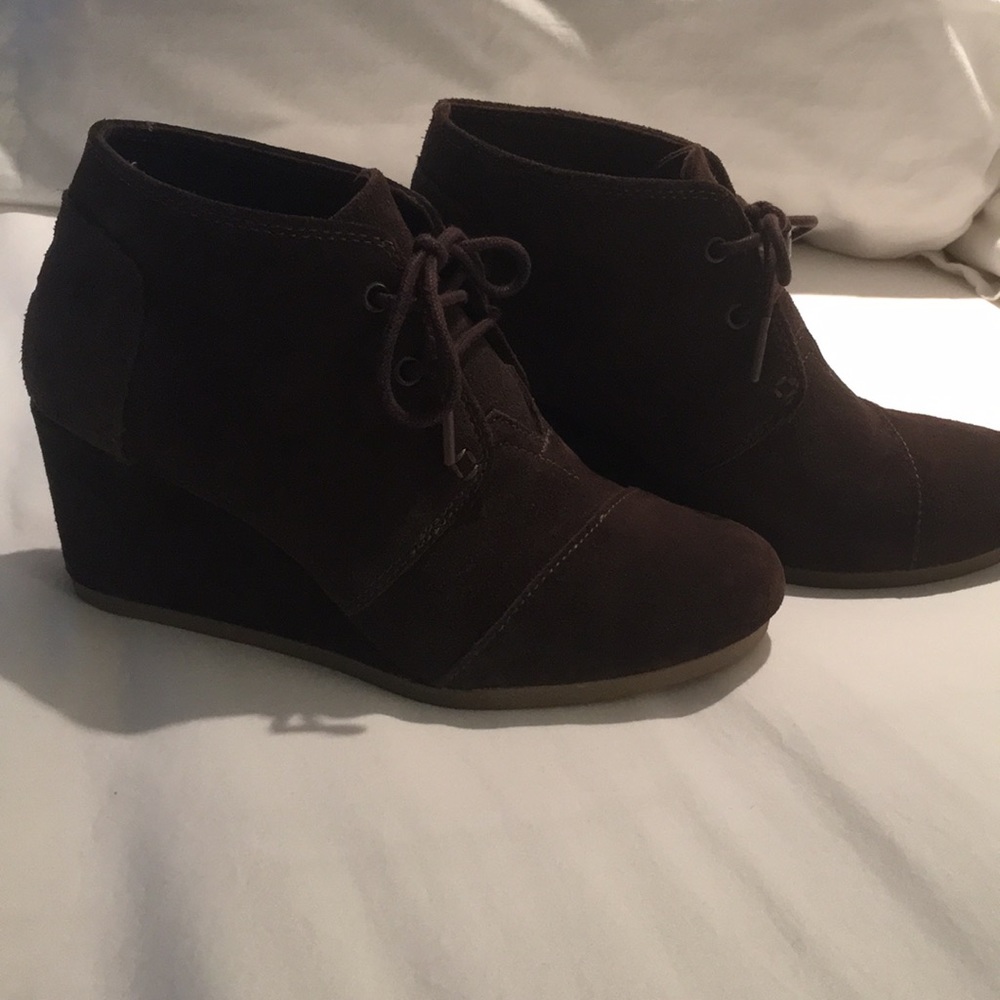 Tom’s brown suede, wedge, lace up booties.